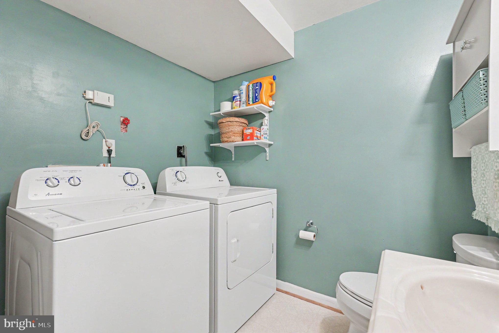8853 Olde Mill Run Road Manassas, VA 20110 - Photo 18 of 29 Bright and functional laundry space.