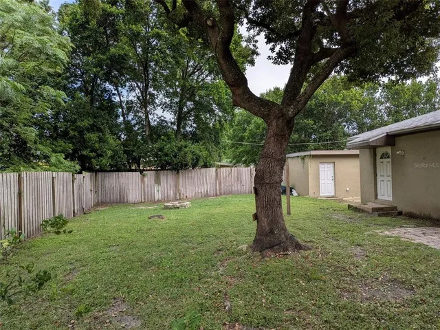 a fire hydrant in the middle of a field
