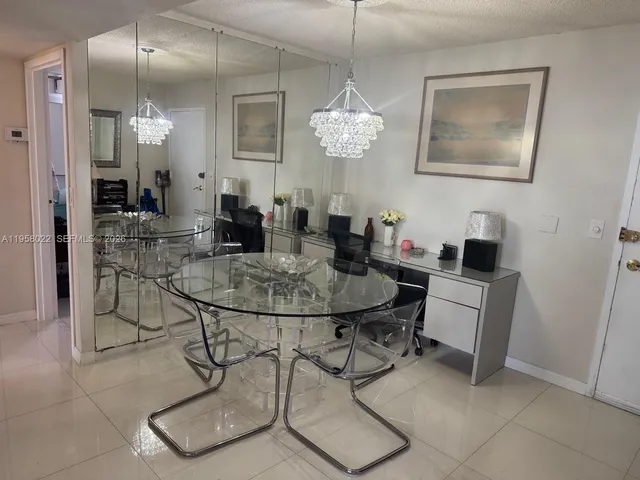 a bedroom with a bed and a furniture