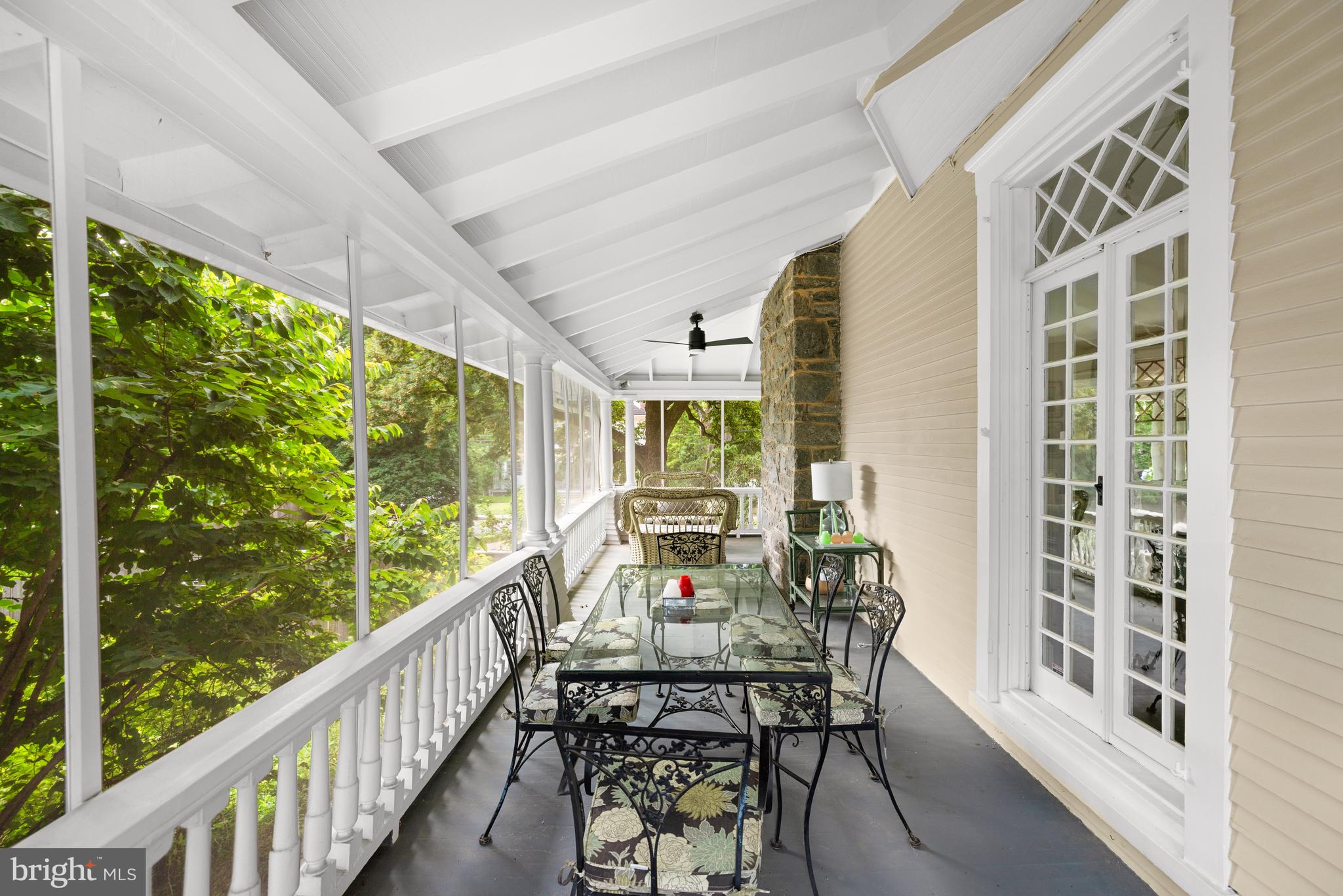 2955 Newark Street Northwest Washington, DC 20008 - Photo 14 of 47 a view of a balcony with table and chairs