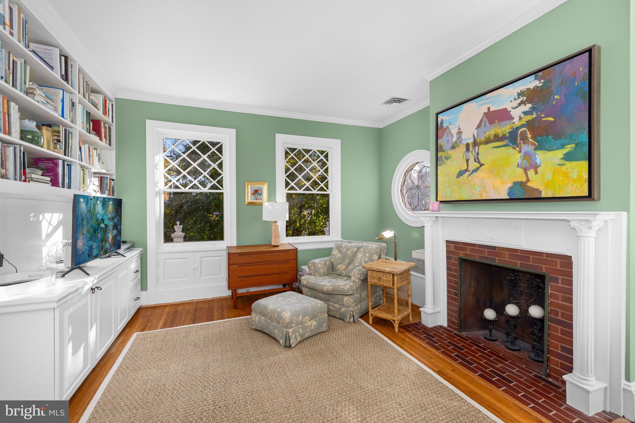 2955 Newark Street Northwest Washington, DC 20008 - Photo 30 of 47 a living room with furniture and a fireplace