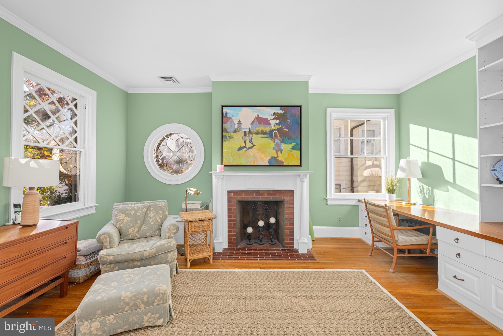 2955 Newark Street Northwest Washington, DC 20008 - Photo 32 of 47 a living room with furniture and a fireplace