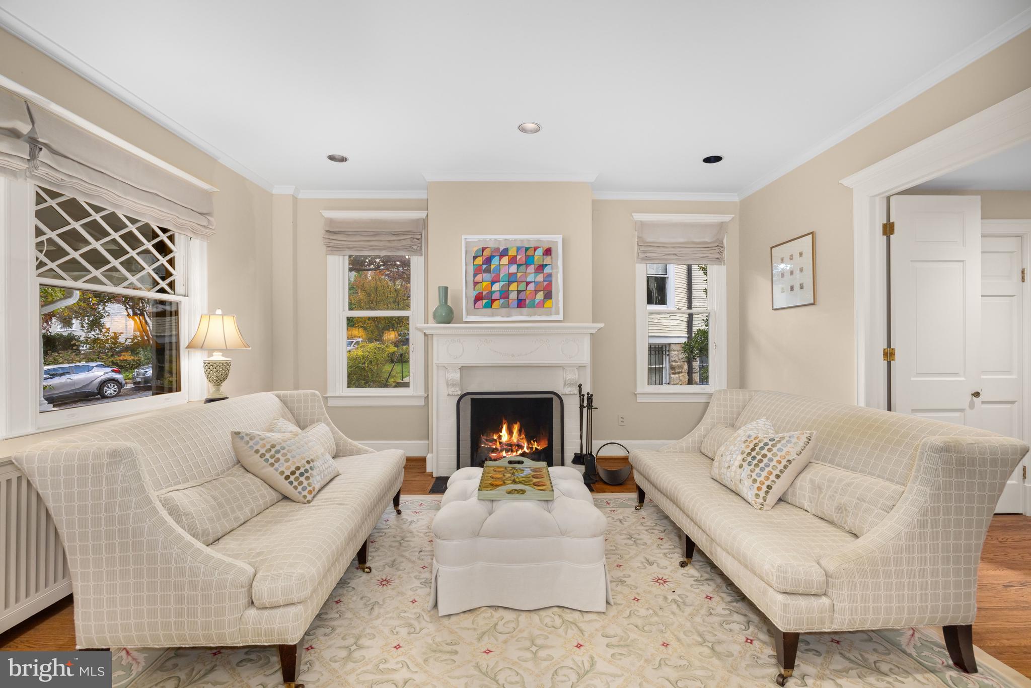 2955 Newark Street Northwest Washington, DC 20008 - Photo 7 of 47 a living room with furniture and a fireplace
