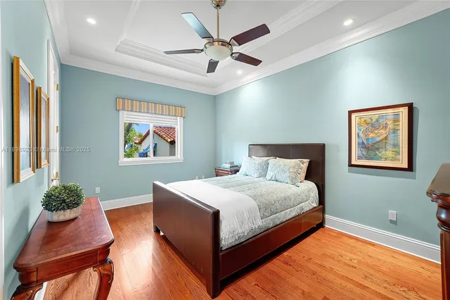 a bed room with a bed and a chair