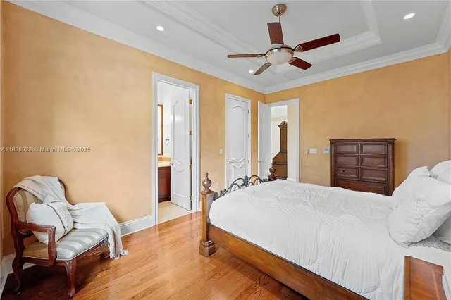 a bedroom with a bed furniture and window