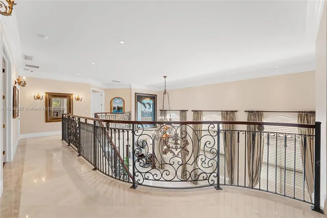 a view of a living room and balcony