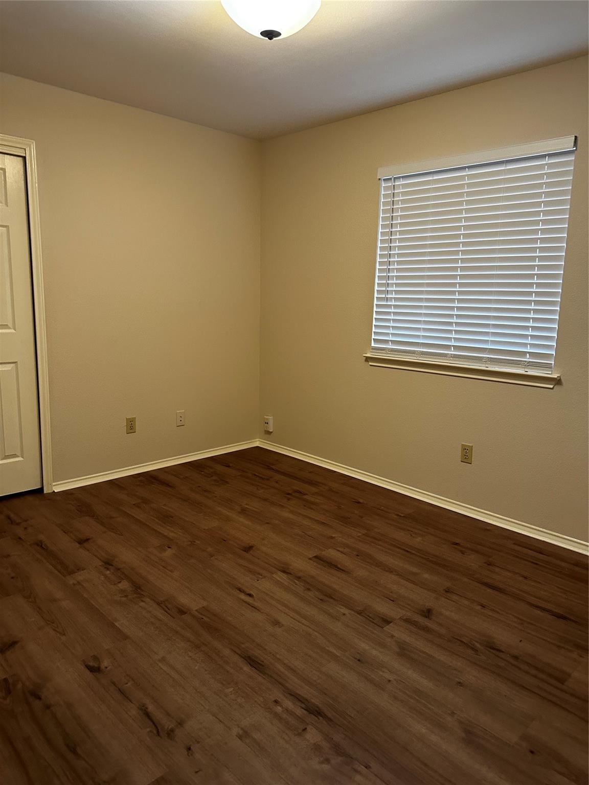 8007 Bounty Trail Austin, TX 78749 - Photo 28 of 32 Laminate flooring adds warmth to this versatile bedroom, ready for your personal touch.