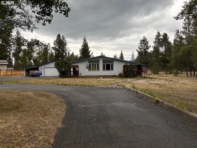 a house with trees in front of it