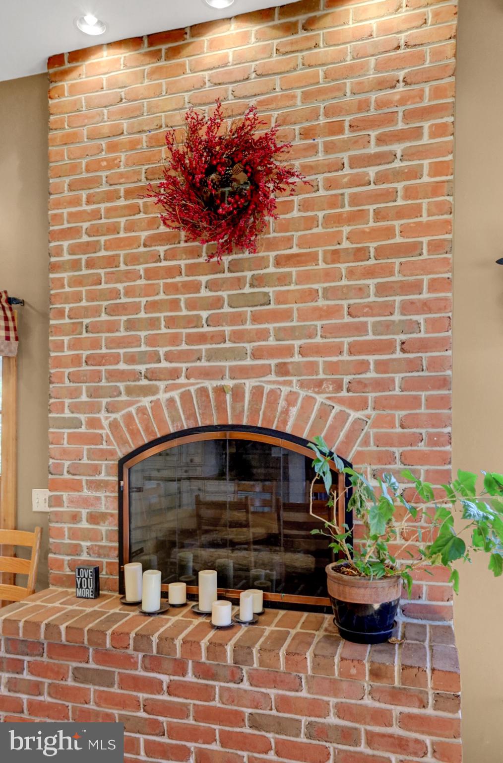 298 Heffner Road Wernersville, PA 19565 - Photo 26 of 58 Woodburning Fireplace with Brick Hearth