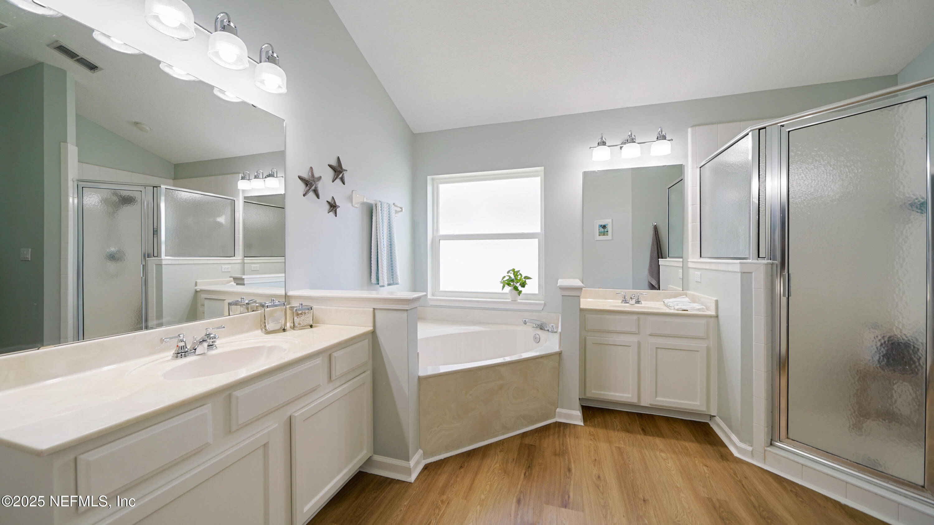 2020 Spring Meadows Court St. Augustine, FL 32092 - Photo 22 of 45 a bathroom with a double vanity sink mirror and double