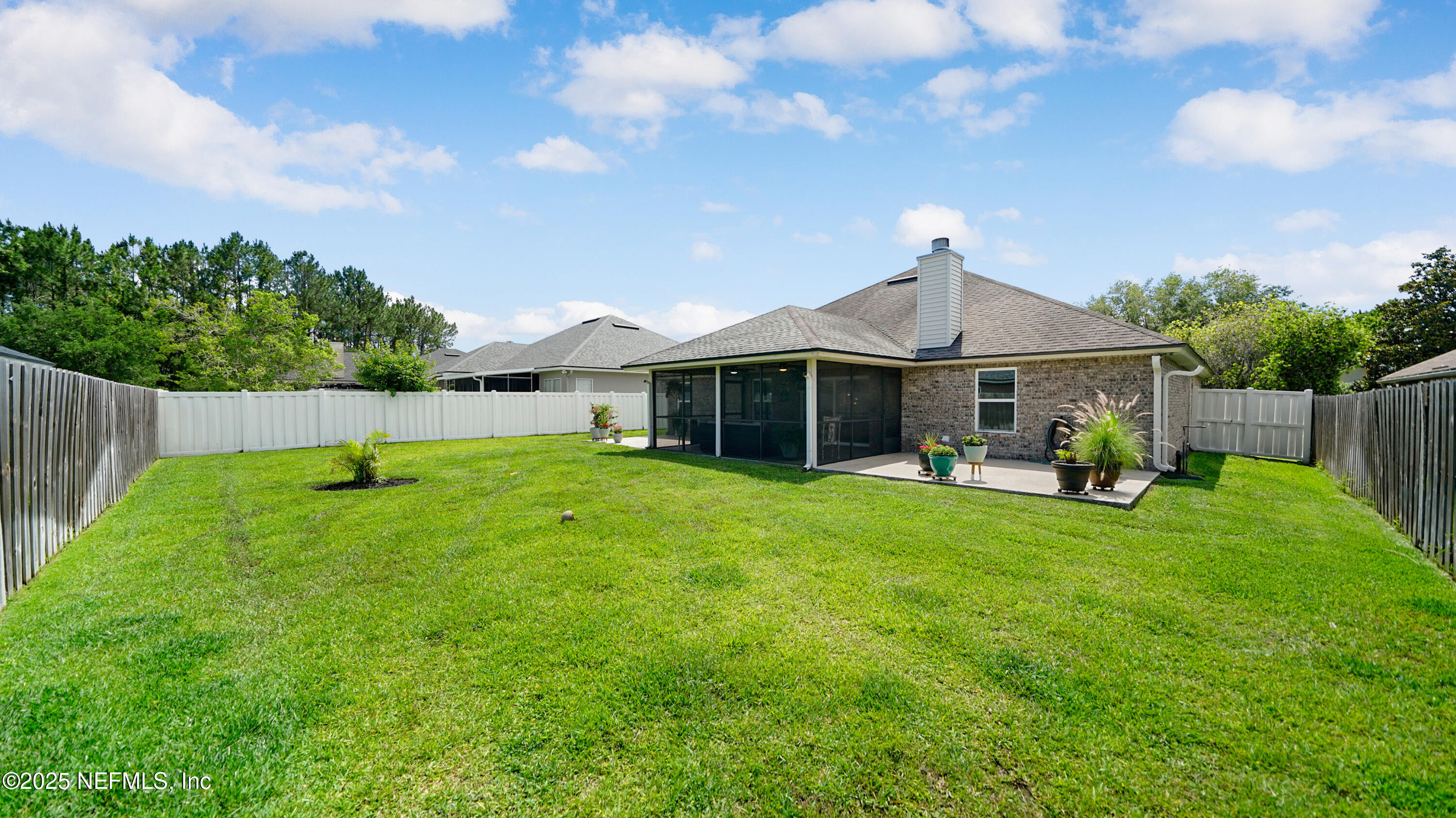 2020 Spring Meadows Court St. Augustine, FL 32092 - Photo 32 of 45 a view of a house with backyard