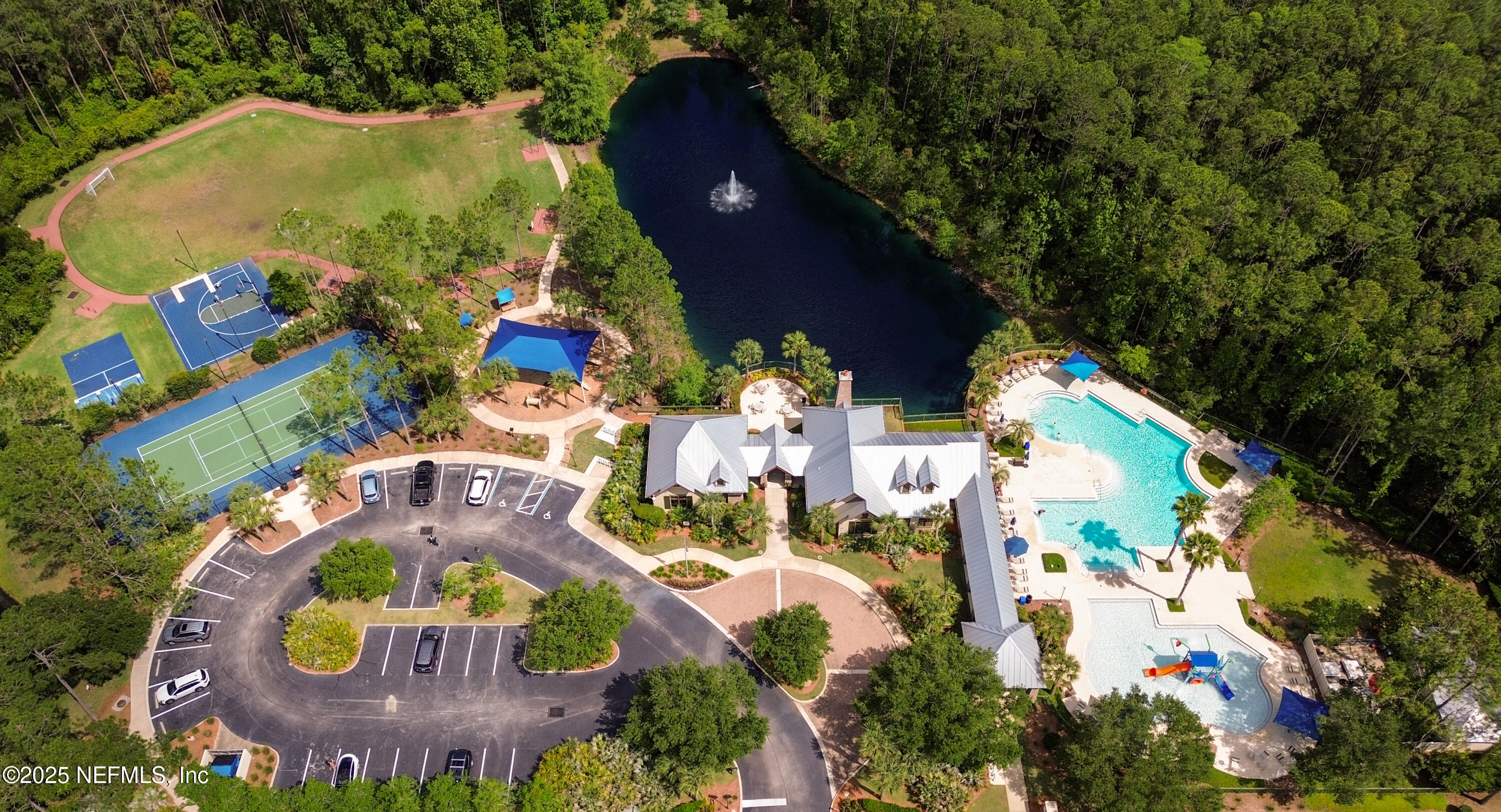 2020 Spring Meadows Court St. Augustine, FL 32092 - Photo 43 of 45 an aerial view of residential house with outdoor space and swimming pool