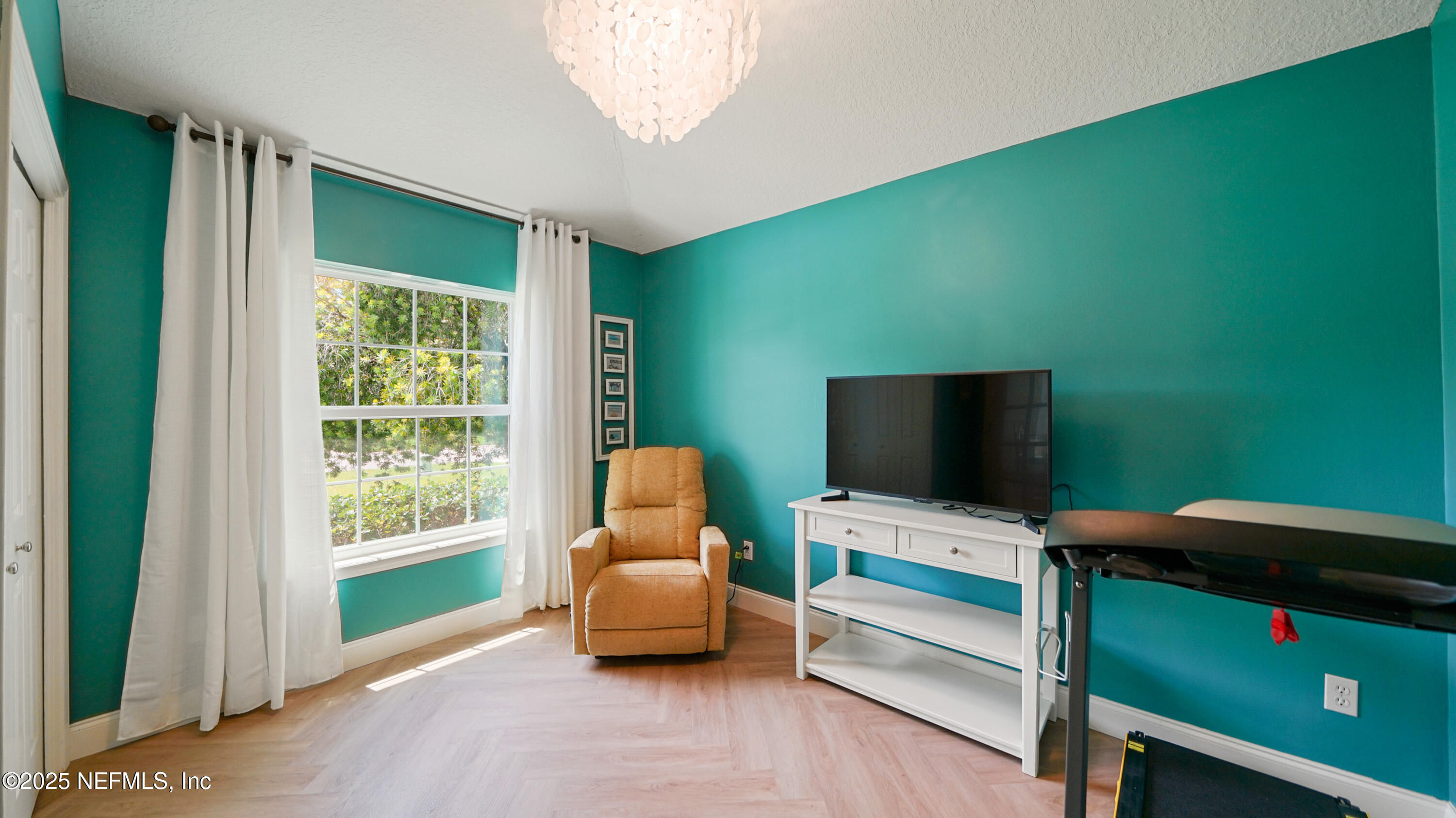 2020 Spring Meadows Court St. Augustine, FL 32092 - Photo 5 of 45 a living room with furniture and a flat screen tv