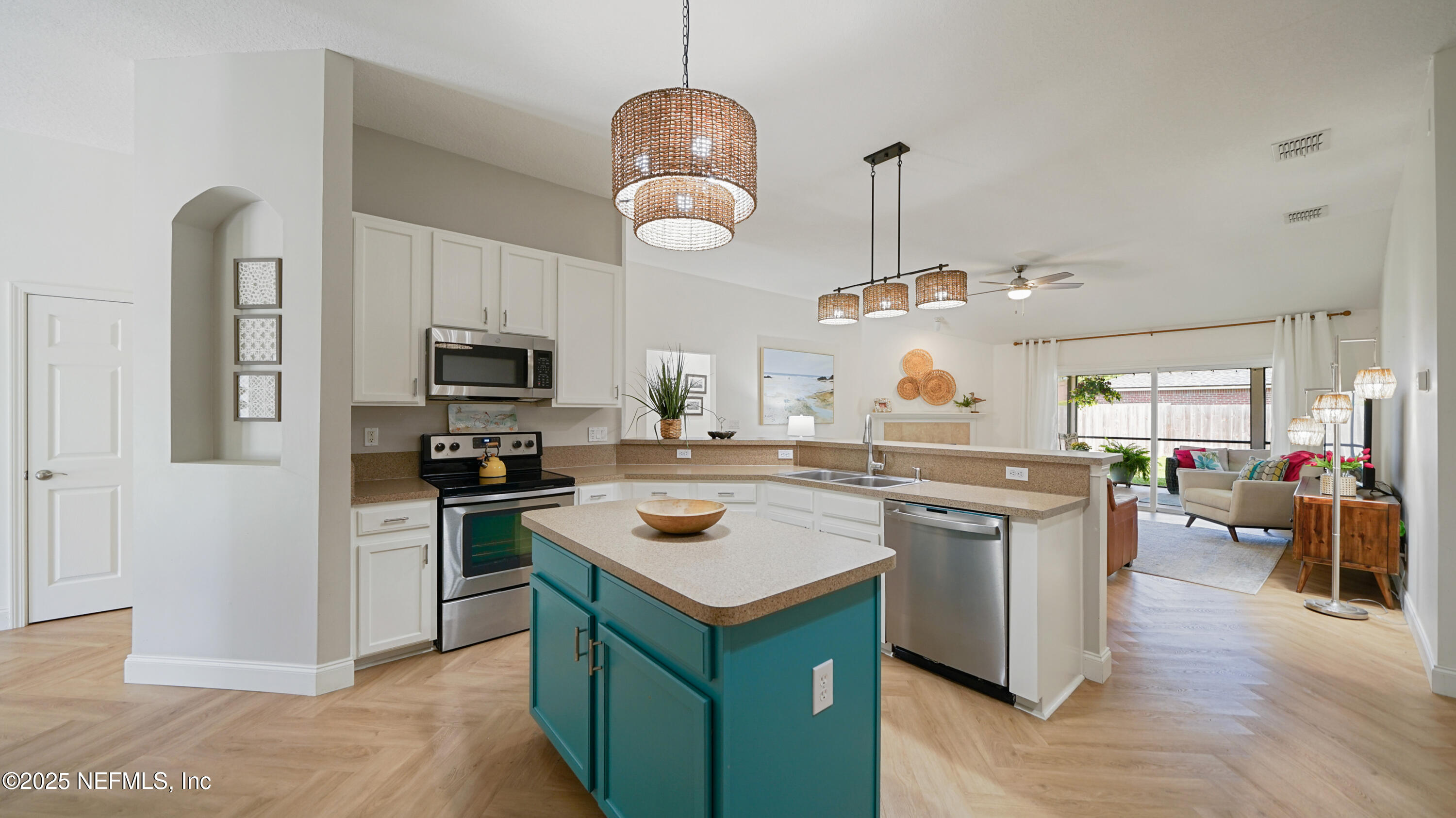 2020 Spring Meadows Court St. Augustine, FL 32092 - Photo 7 of 45 a kitchen that has a lot of cabinets in it
