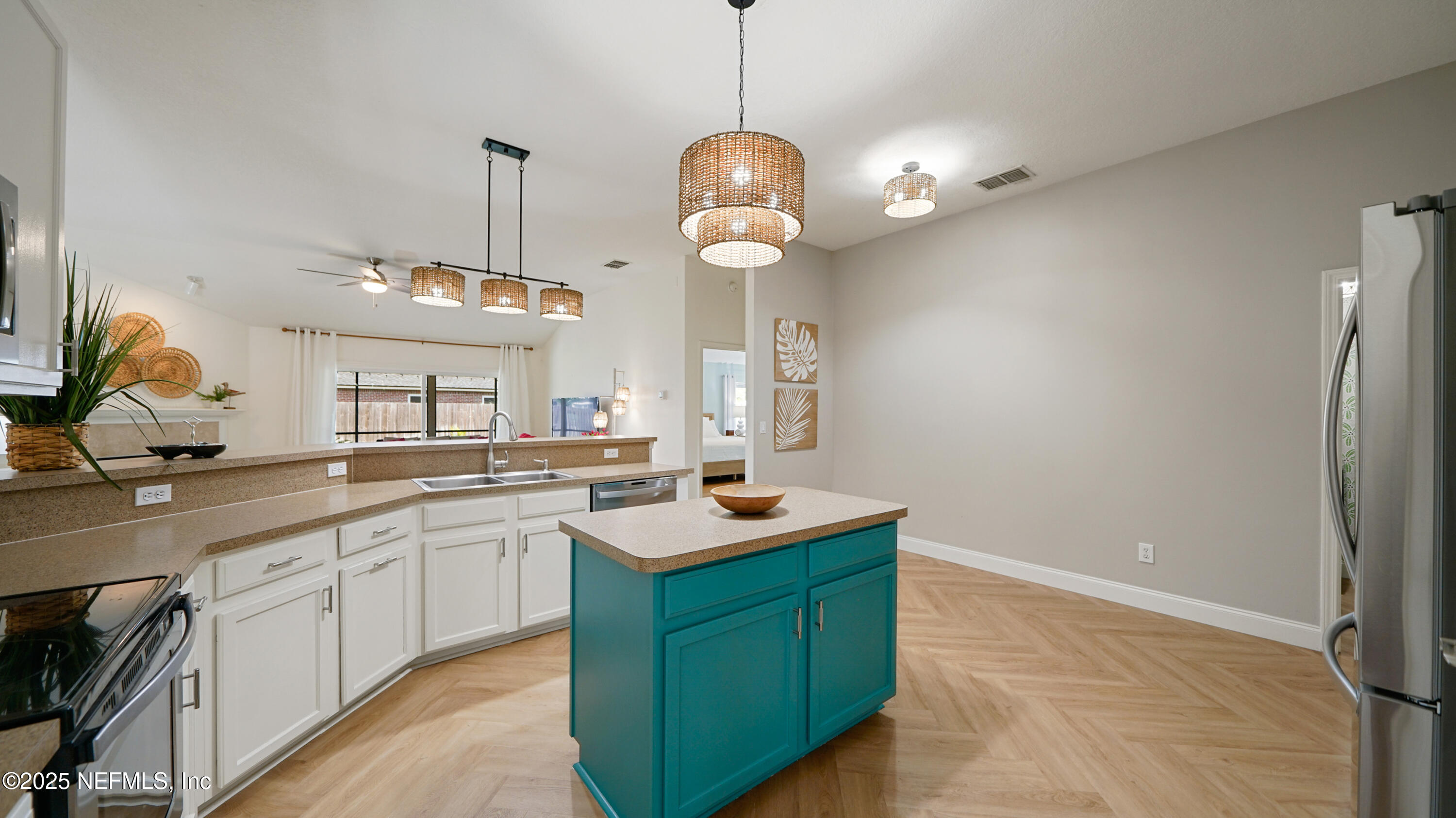 2020 Spring Meadows Court St. Augustine, FL 32092 - Photo 10 of 45 a kitchen with a sink a counter space cabinets and appliances