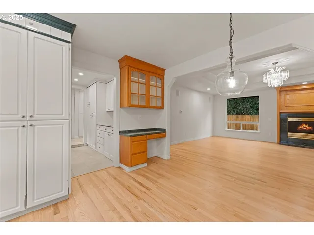 a bedroom with a bed and a television