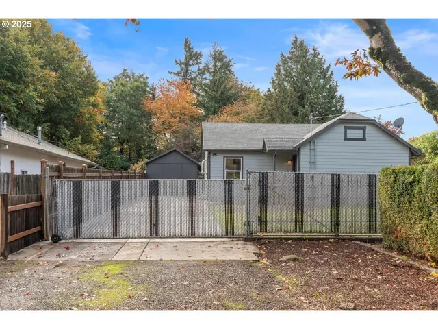 a house with a tree in front of it