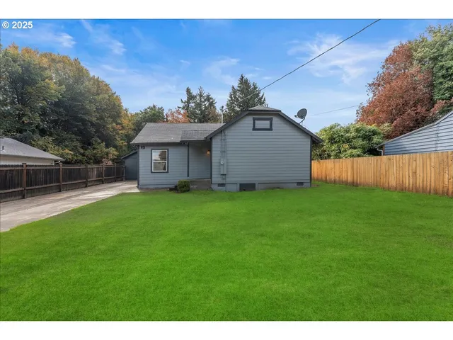 a view of a backyard with a garden