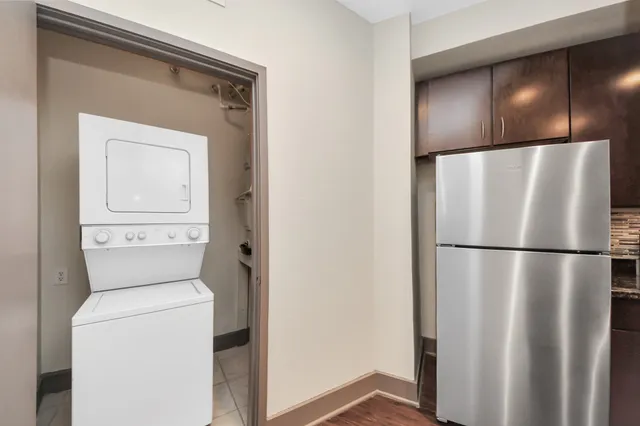 a view of a kitchen from the hallway