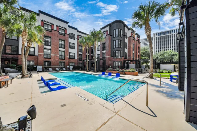 a view of a building with sitting area