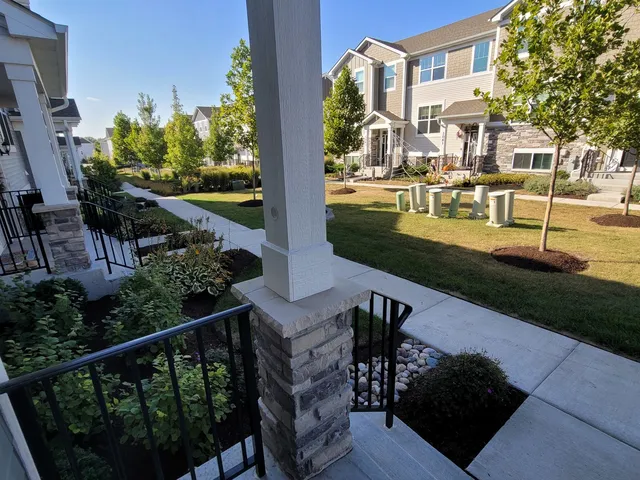 a view of a patio in backyard