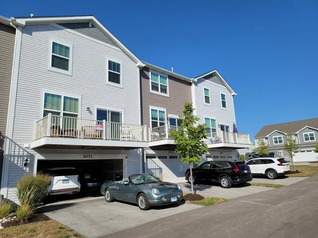 a car parked in front of a house
