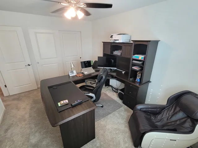 a view of workspace with lounge chair