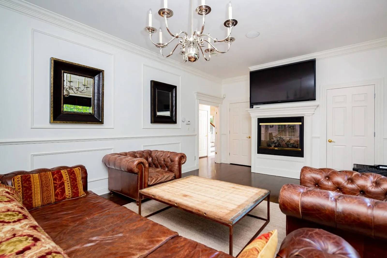 335 Water Mill Water Mill, NY 11976 - Photo 15 of 45 a living room with furniture and a flat screen tv