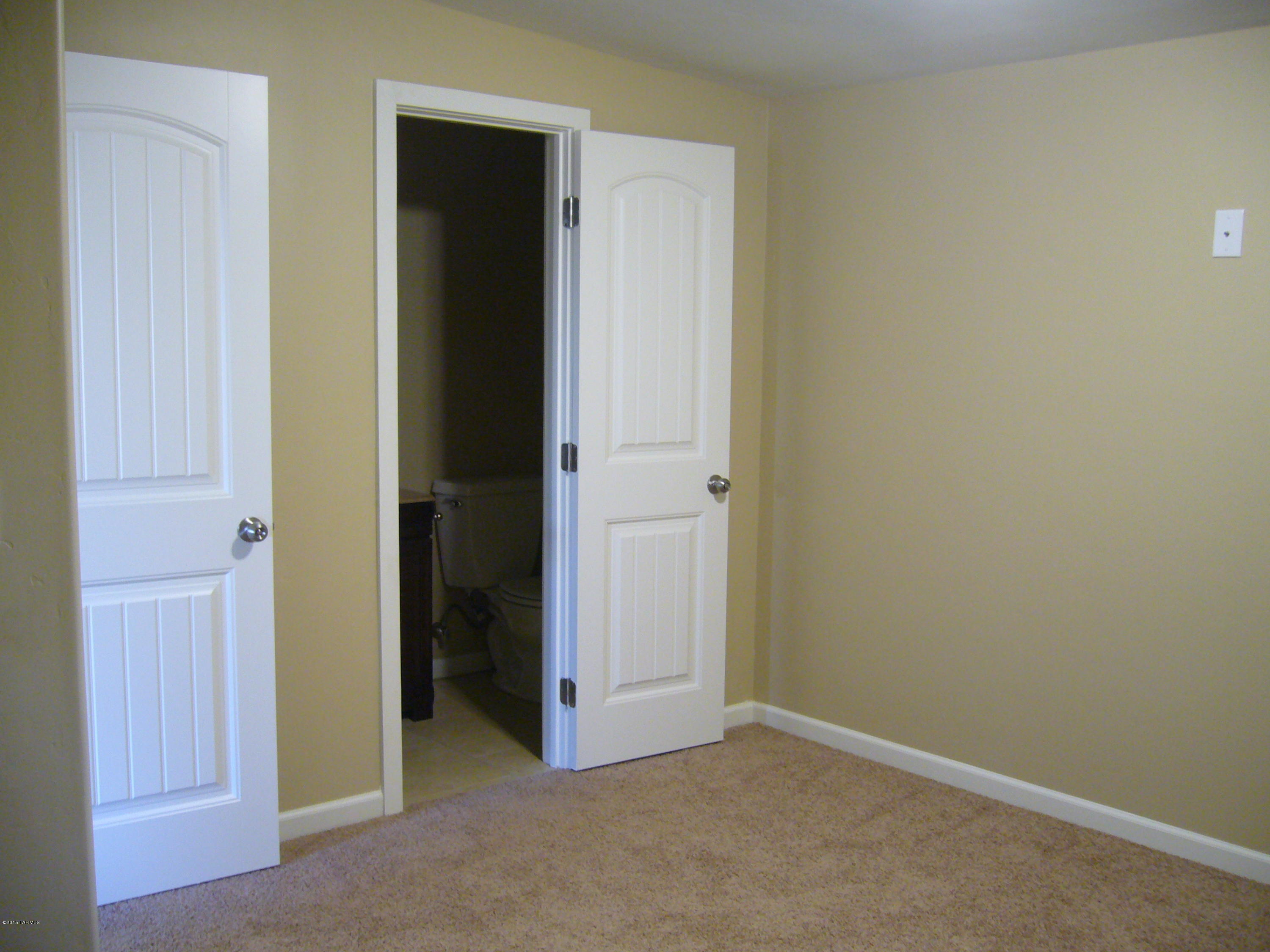 1243 West Kleindale Road Tucson, AZ 85705 - Photo 30 of 46 an empty room with closet