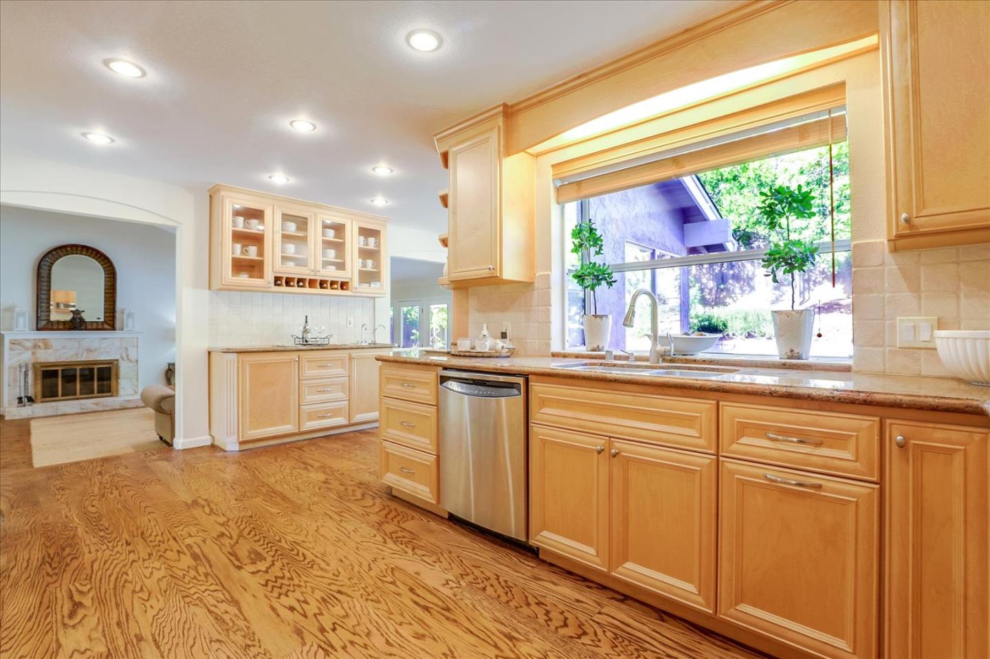 1262 Chateau Drive San Jose, CA 95120 - Photo 15 of 57 a kitchen with stainless steel appliances granite countertop a stove a sink and a refrigerator