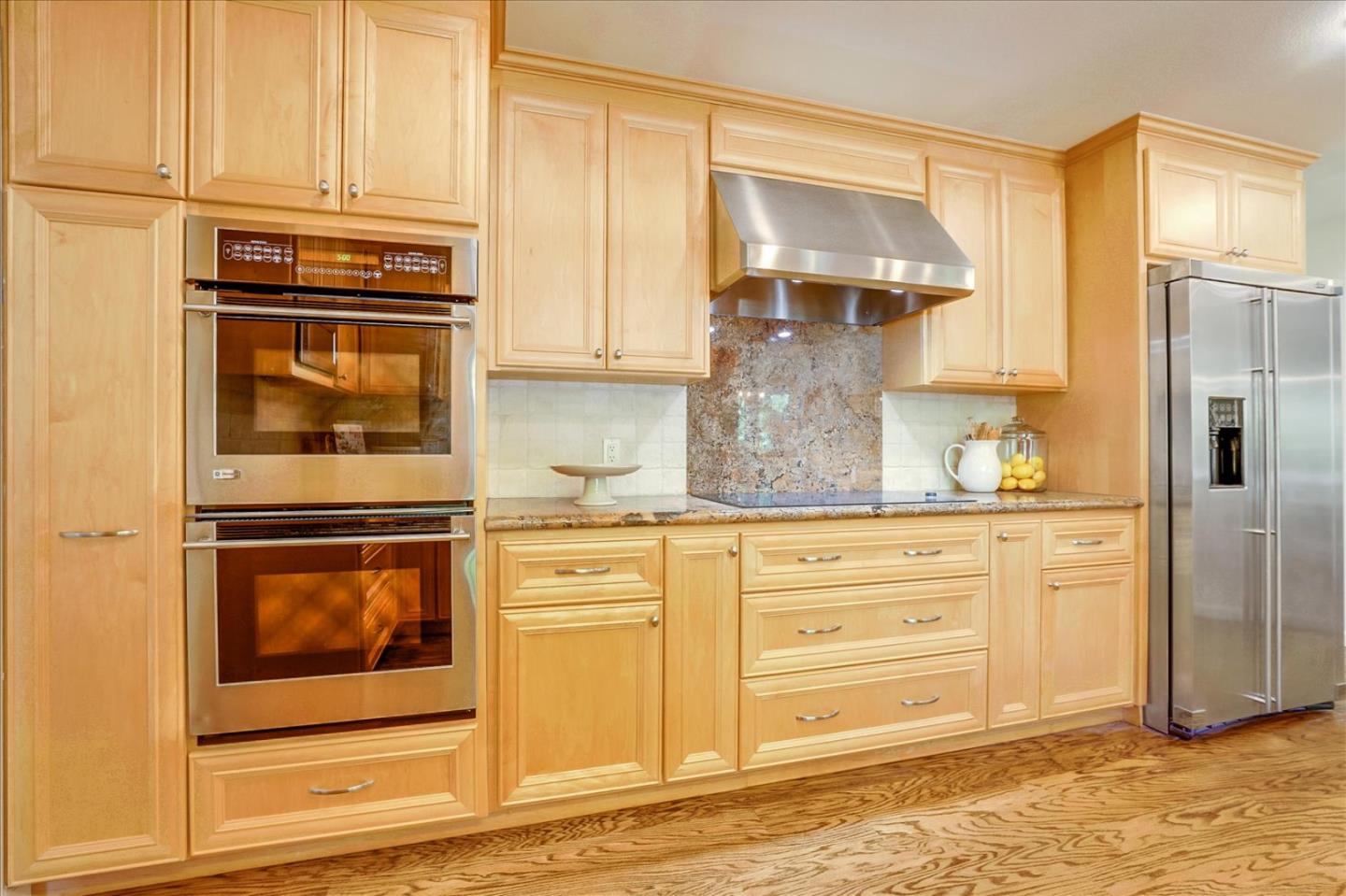 1262 Chateau Drive San Jose, CA 95120 - Photo 18 of 57 a kitchen with granite countertop cabinets stainless steel appliances and a window
