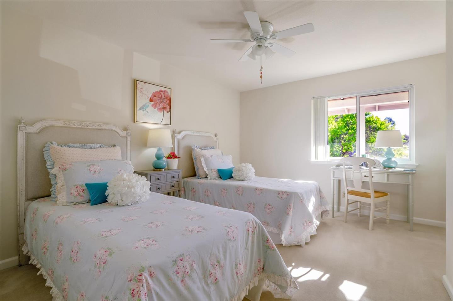 1262 Chateau Drive San Jose, CA 95120 - Photo 33 of 57 a bedroom with a bed and a table