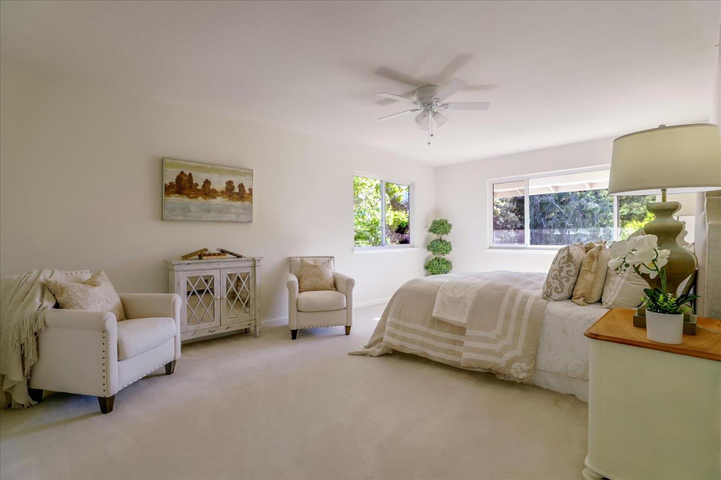 1262 Chateau Drive San Jose, CA 95120 - Photo 35 of 57 a spacious bedroom with bed and a couch