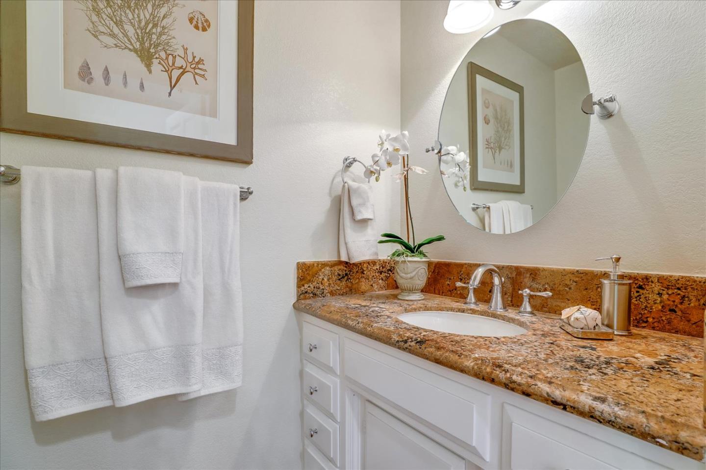 1262 Chateau Drive San Jose, CA 95120 - Photo 39 of 57 a bathroom with a granite countertop sink and a mirror