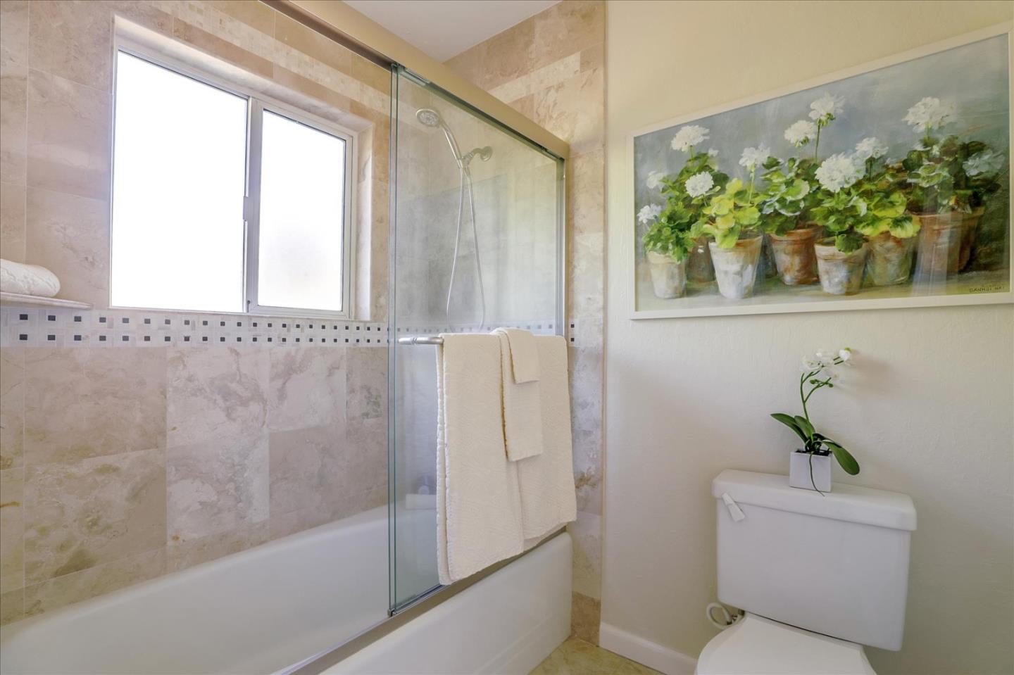 1262 Chateau Drive San Jose, CA 95120 - Photo 41 of 57 a bathroom with a shower and a bathtub