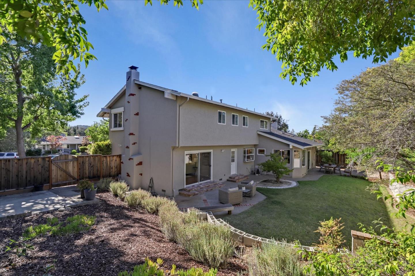 1262 Chateau Drive San Jose, CA 95120 - Photo 48 of 57 a backyard of a house with yard and outdoor seating