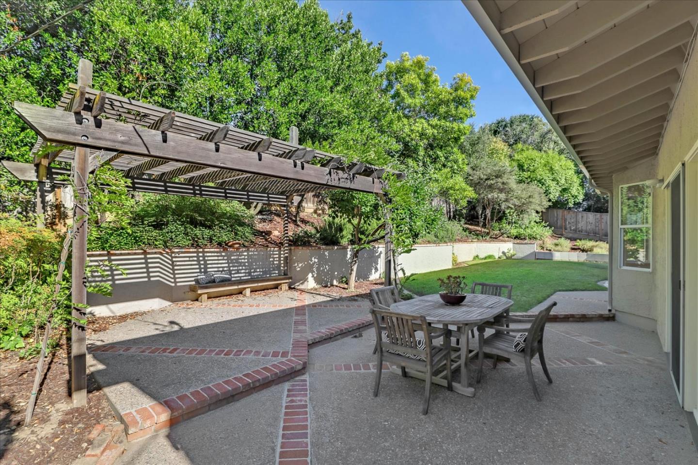 1262 Chateau Drive San Jose, CA 95120 - Photo 52 of 57 a view of a chairs and table in backyard of the house