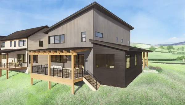 a view of a house with a yard and balcony