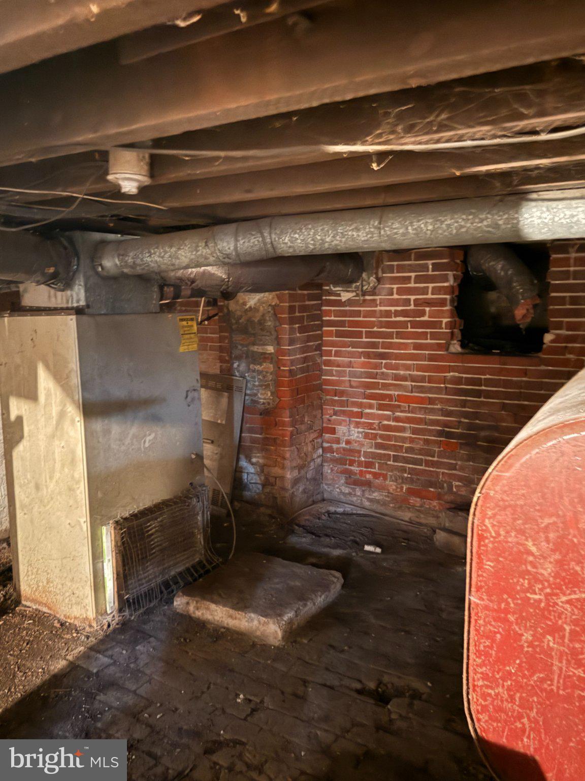 176 Griffith Street Salem, NJ 08079 - Photo 32 of 36 Basement with industrial heating system.