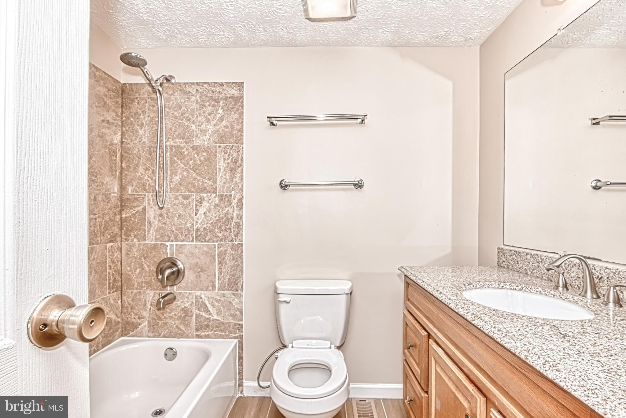 12828 Pinecrest Road Herndon, VA 20171 - Photo 18 of 46 Hall Bathroom