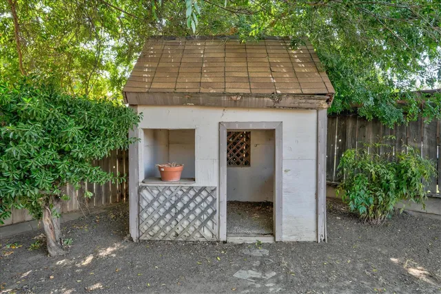 a view of wooden floor in a backyard