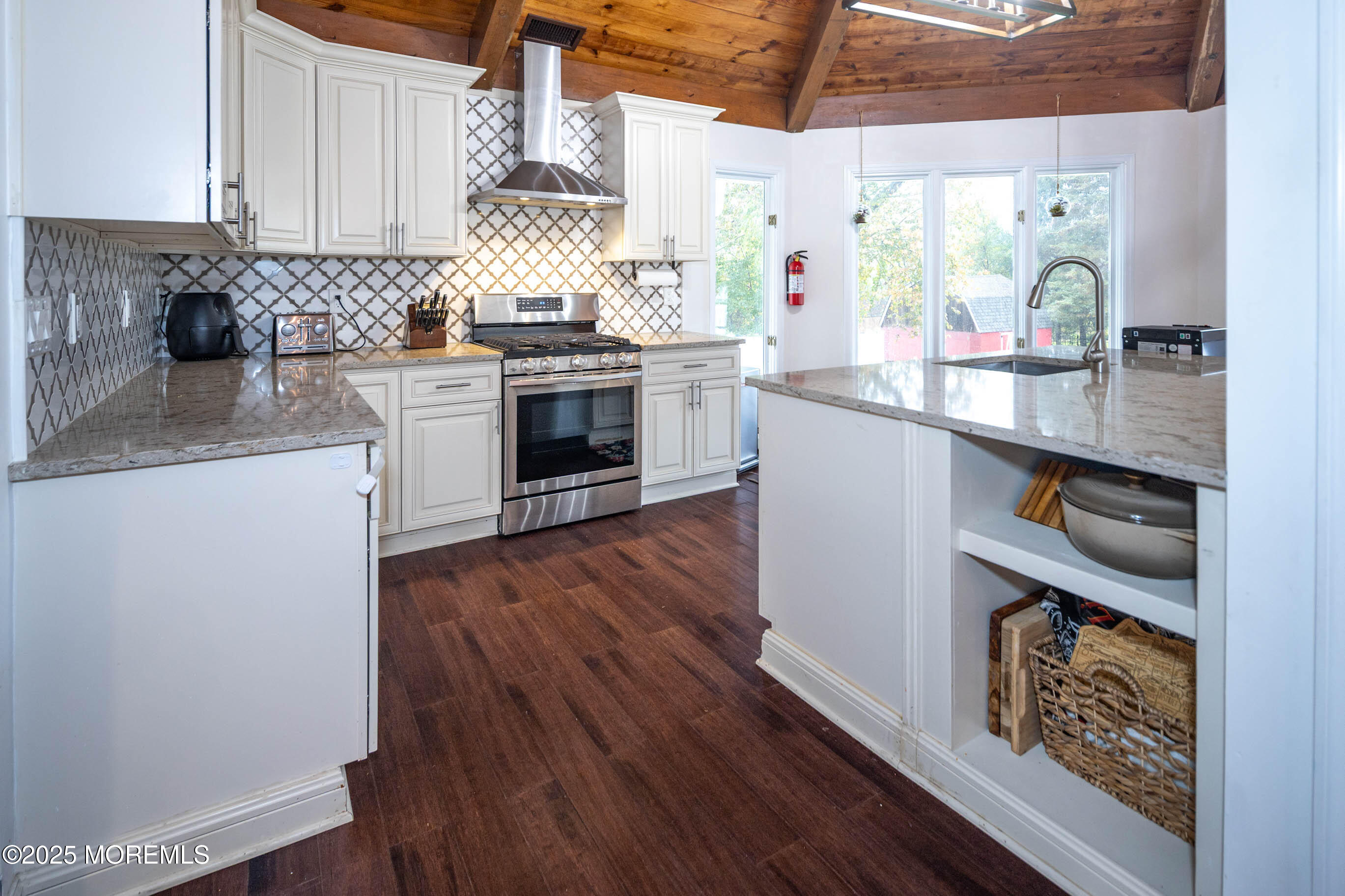 29 Telegraph Hill Road Holmdel, NJ 07733 - Photo 15 of 61 a kitchen with stainless steel appliances granite countertop a stove a sink and a refrigerator