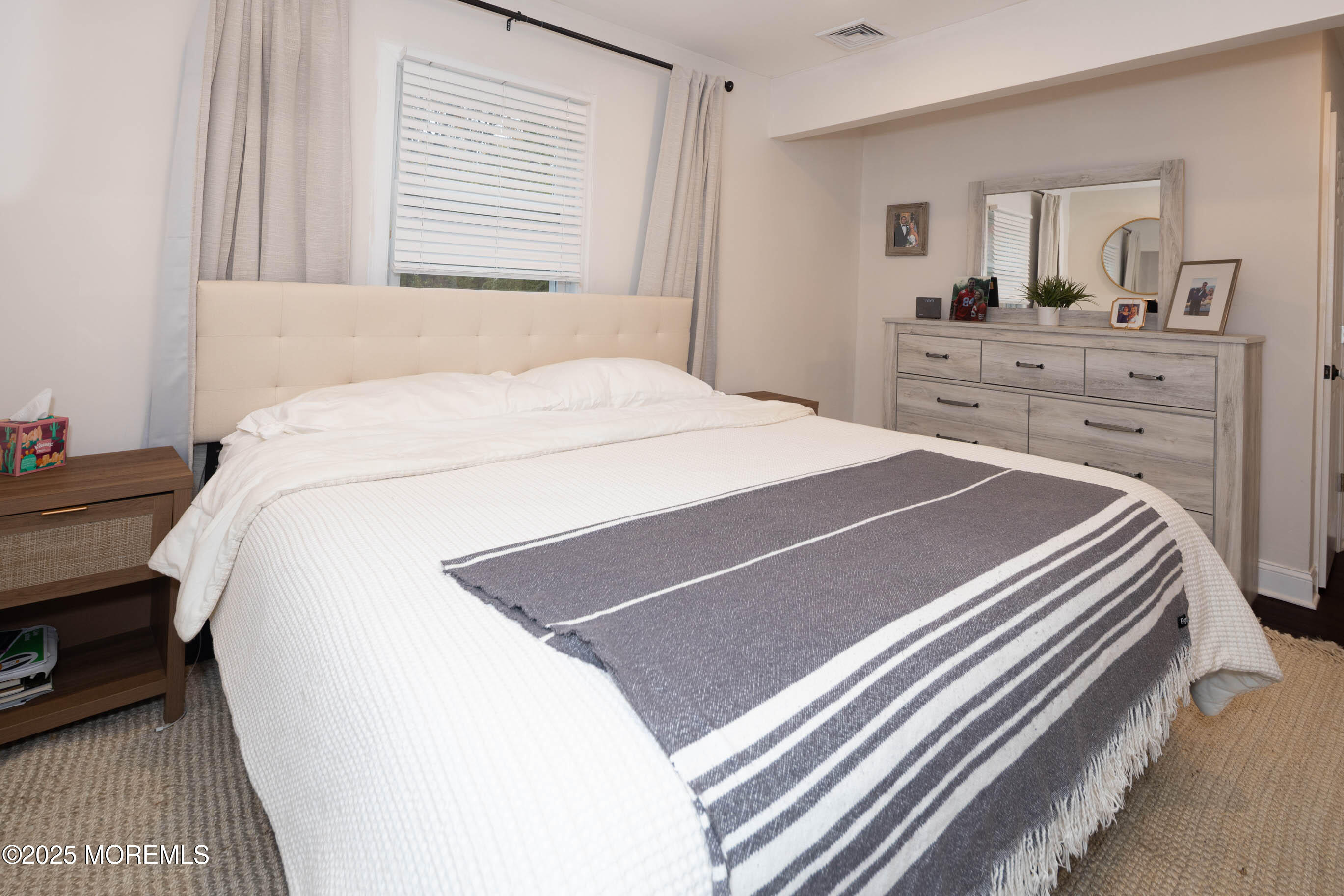 29 Telegraph Hill Road Holmdel, NJ 07733 - Photo 23 of 61 a bed sitting in a bedroom and dresser
