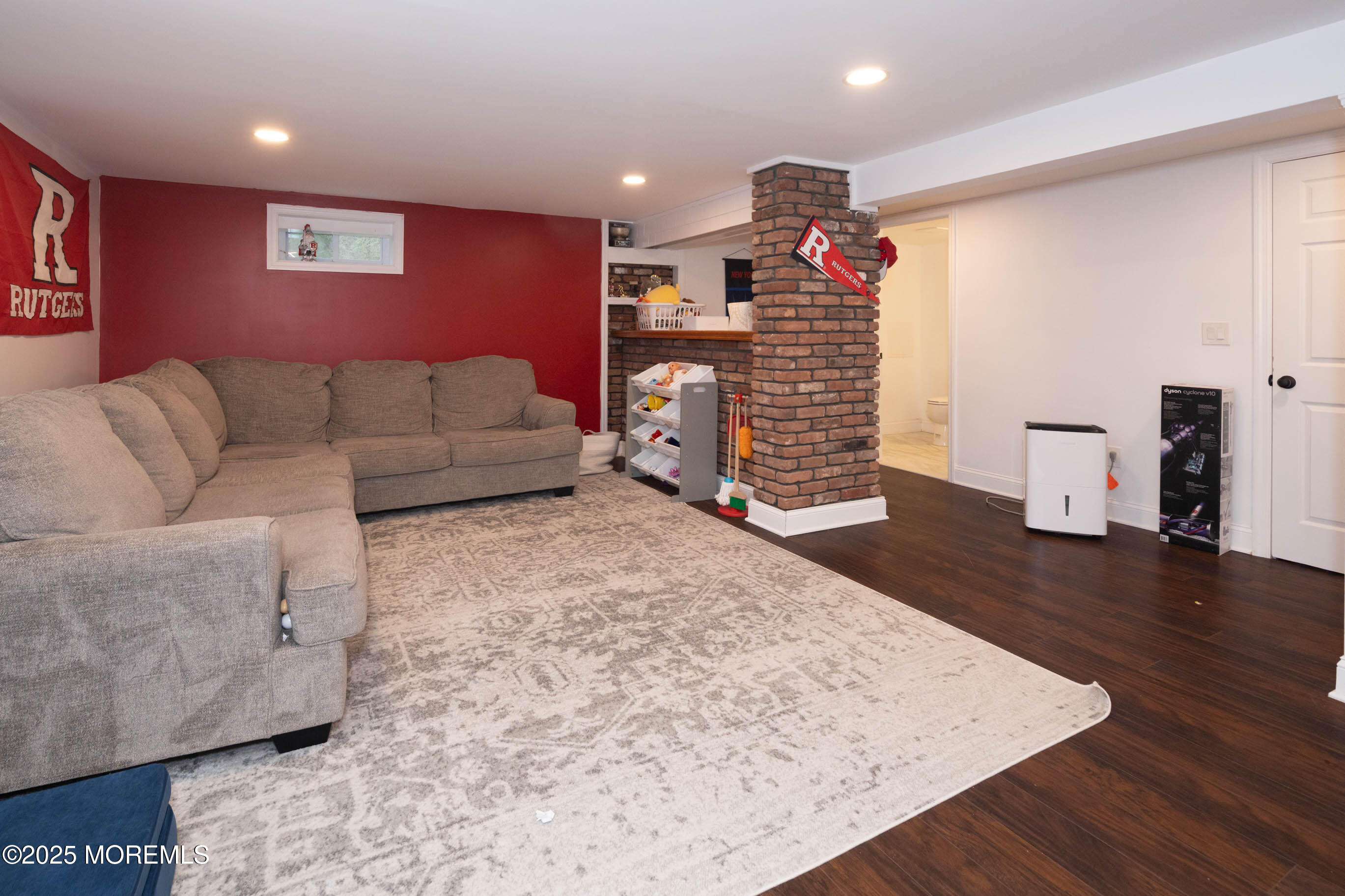 29 Telegraph Hill Road Holmdel, NJ 07733 - Photo 29 of 61 a living room with furniture and wooden floor