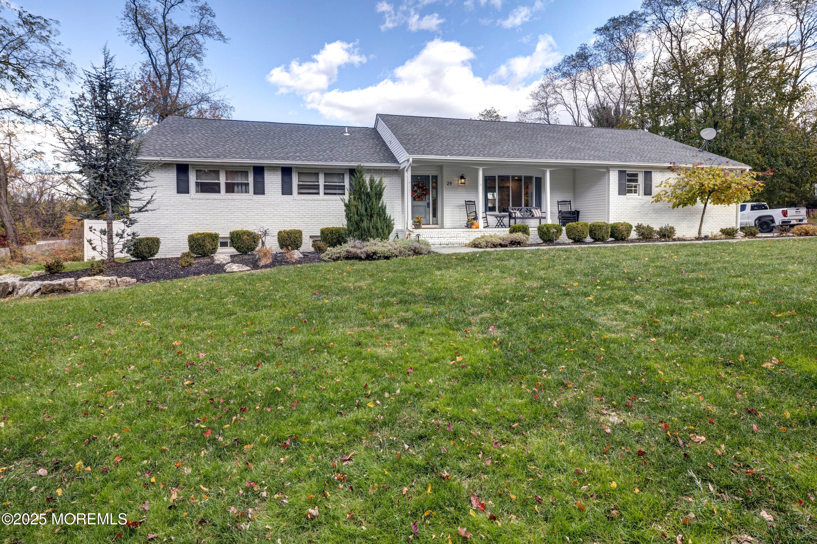 29 Telegraph Hill Road Holmdel, NJ 07733 - Photo 39 of 61 a front view of a house with a yard