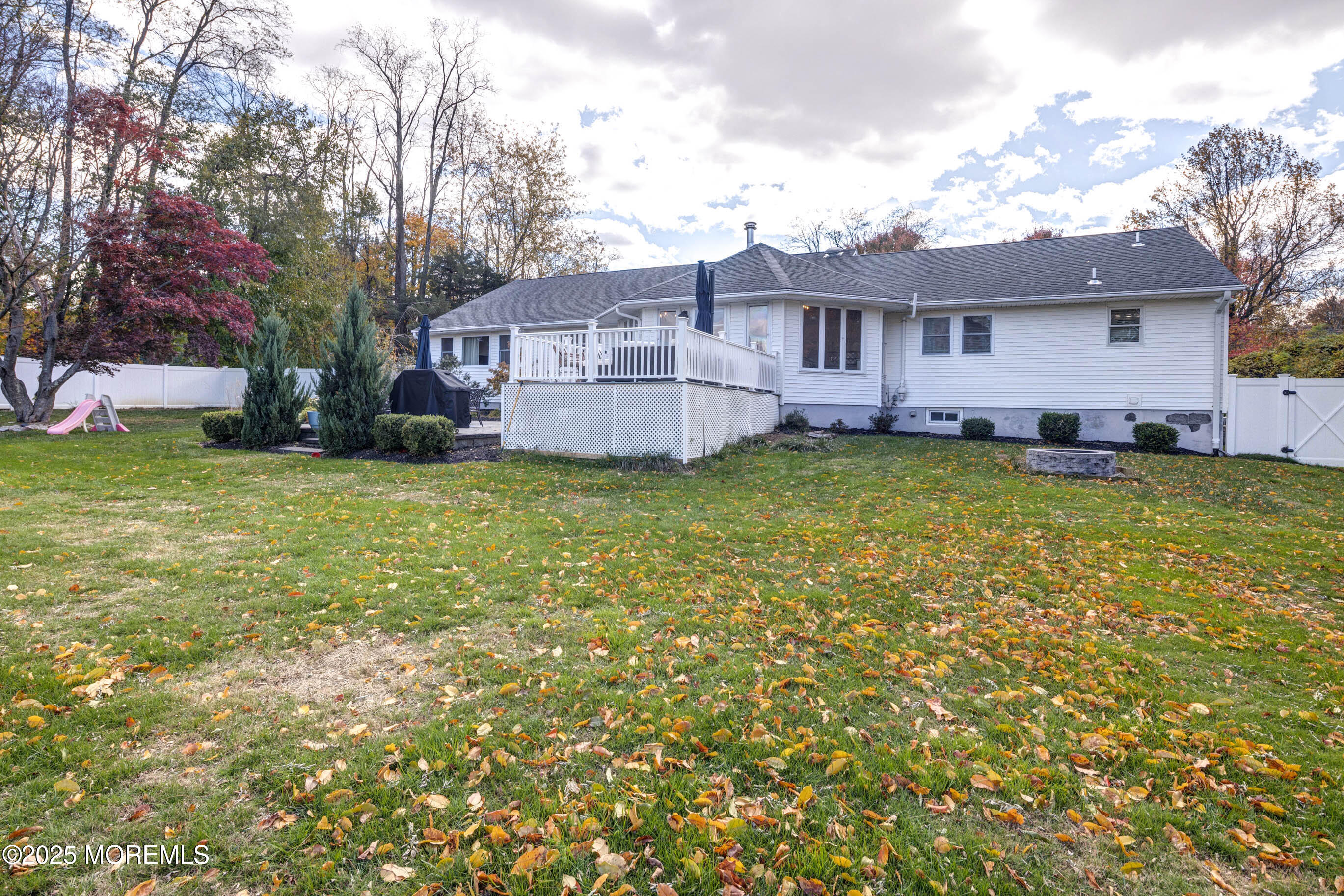 29 Telegraph Hill Road Holmdel, NJ 07733 - Photo 44 of 61 a view of a house with a big yard and a large tree