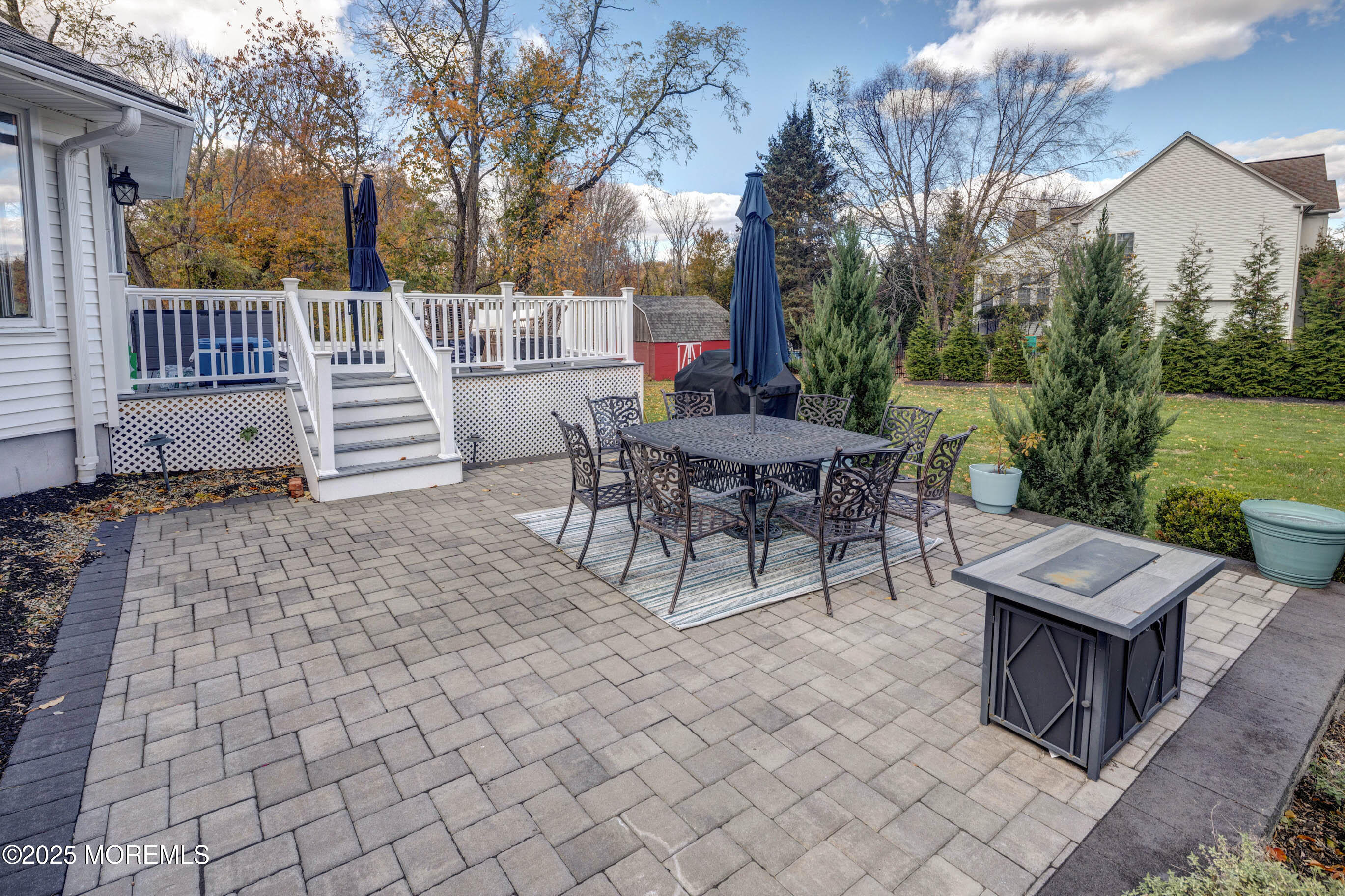 29 Telegraph Hill Road Holmdel, NJ 07733 - Photo 47 of 61 a view of a patio with a yard