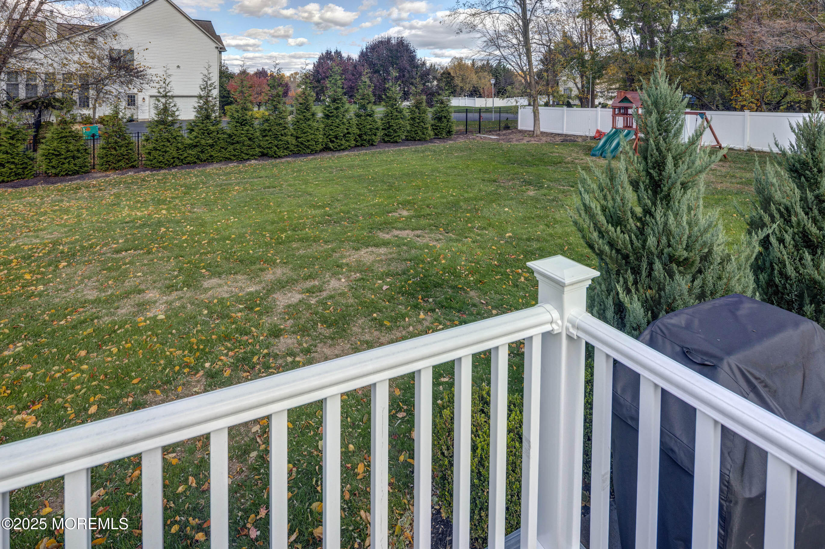 29 Telegraph Hill Road Holmdel, NJ 07733 - Photo 50 of 61 a view of a wooden fence and a yard