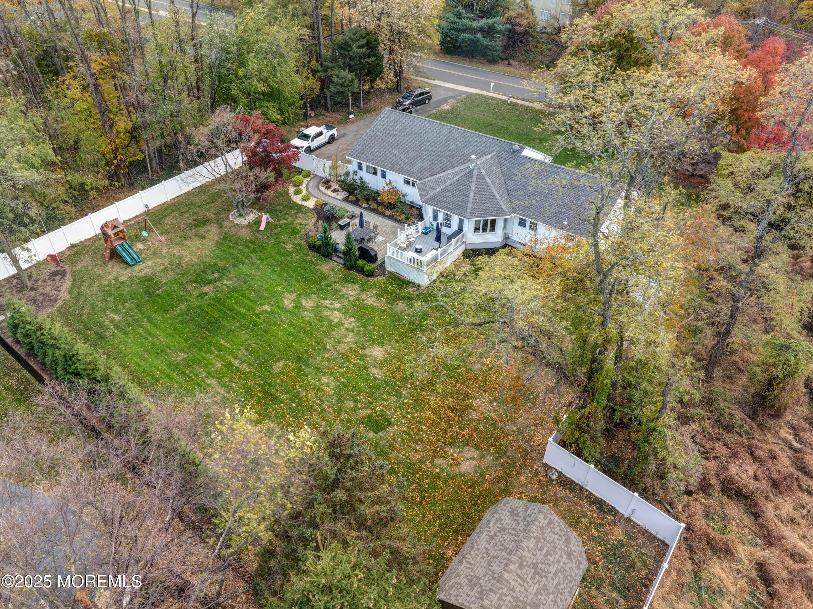 29 Telegraph Hill Road Holmdel, NJ 07733 - Photo 56 of 61 a aerial view of a house with a yard basket ball court and outdoor seating