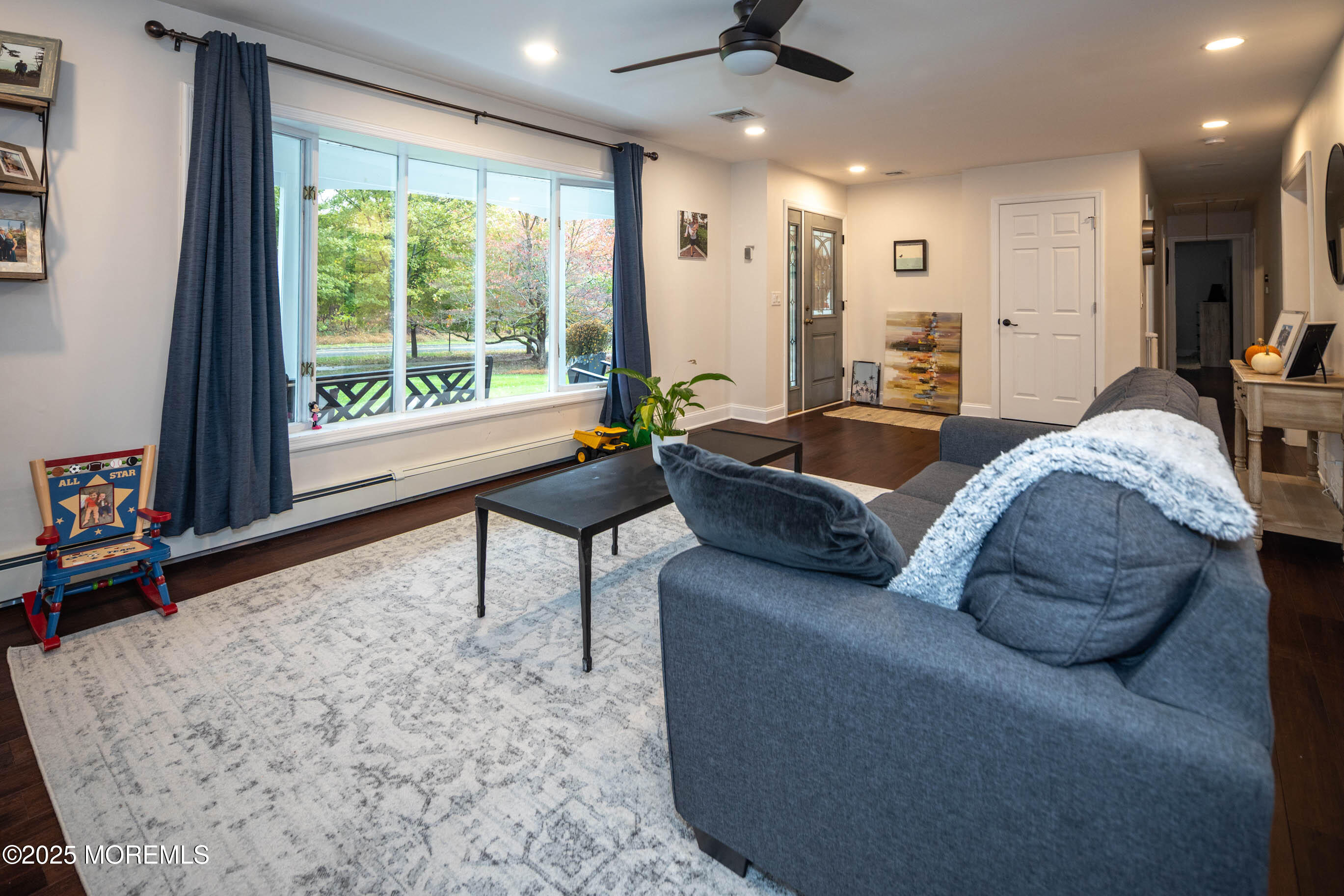 29 Telegraph Hill Road Holmdel, NJ 07733 - Photo 6 of 61 a living room with furniture and a large window